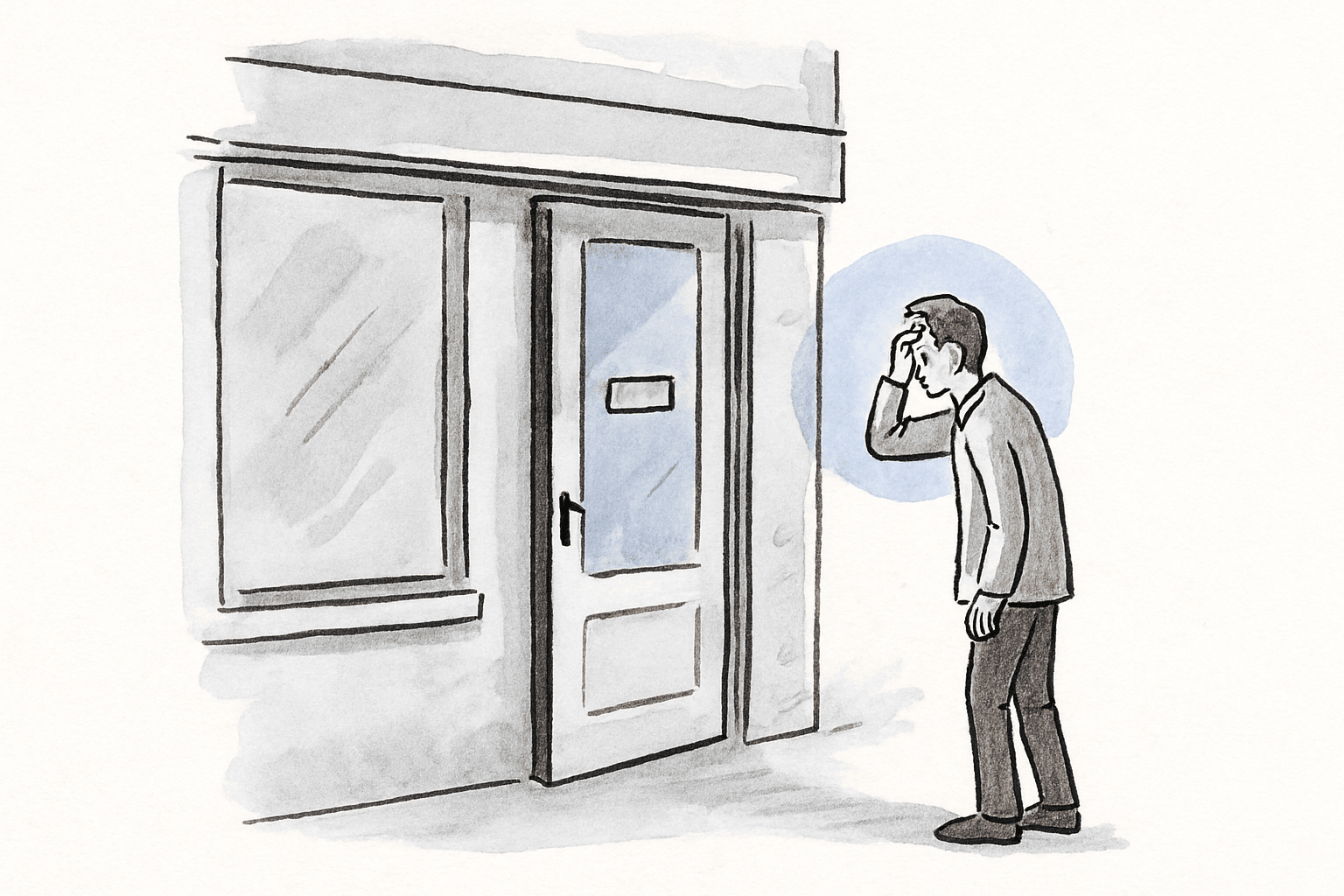 A person standing outside a plain shop front with only a nameplate on the door and no indication of what is inside